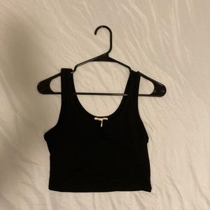 a crop top type,black shirt, size medium